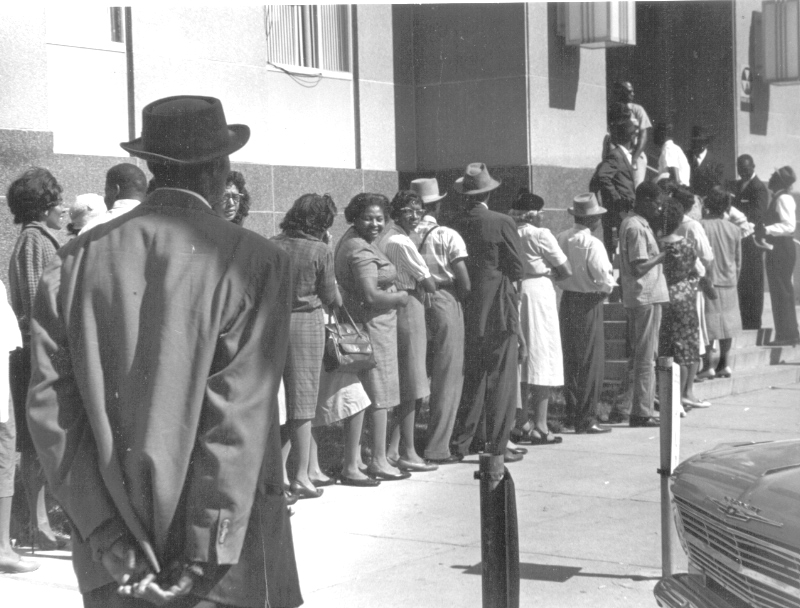 "Freedom Day" in Selma, October 1963. Blacks line up at the courthouse to apply to register to vote. (c) John Kouns.